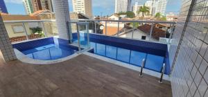 Lindo apto piscina liberada e próximo à praia QX01H