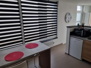 Maisons de vacances Maisonnette cosy : photos des chambres