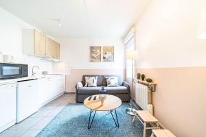 Appartements Le petit Montel- studio avec garage-metro Valmy : photos des chambres