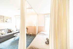 Appartements Le petit Montel- studio avec garage-metro Valmy : photos des chambres