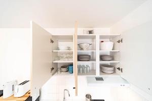 Appartements Le petit Montel- studio avec garage-metro Valmy : photos des chambres