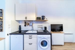 Appartements Le petit Cottin cosy 2 pers metro Valmy : photos des chambres