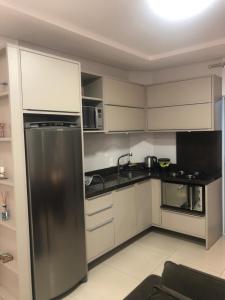 Apto familiar, 150mts do mar, completo e aconchegante em Palmas