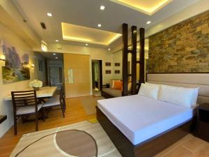 PICO DE LORO ACCOMMODATIONS NORMAN AND LOURDES RESORT & CONDO PH