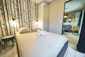 Appartements Le petit Bourbonnais - patio privatif- metro Valmy : photos des chambres