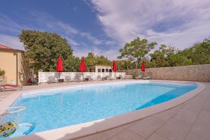 Apartmani Lovren - 3hvězdičkové hotely ve městě Novalja