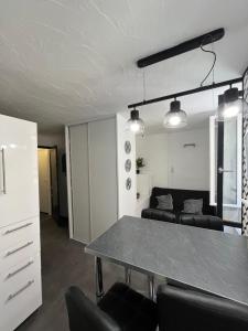 Appartements Le central : photos des chambres