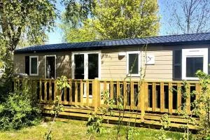 Modern holiday Chalet on lake side holiday park - Lauwersoog