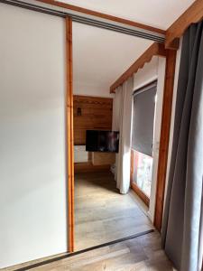 Appartements Chaleureux logement pieds des pistes Valmeinier 1800 - Vue Montagne - 6 personnes : photos des chambres