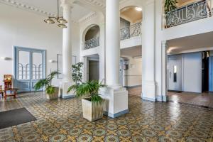 Appartements Dans l’ancien Grand Hotel T3 lumineux : photos des chambres