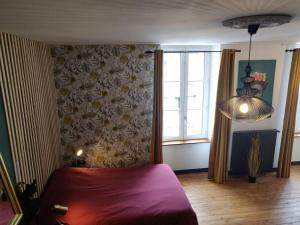 Appartements De Vert et d'Or - proche gare - parking - jardin : photos des chambres