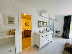 Casa de 3 plantas, con jardín y vistas al golf