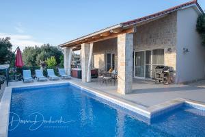 Island Villa Adriana with heated pool and sauna