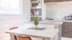 Complexes hoteliers Le Theven : Suite Bungalow avec Toit-Terrasse et Spa Privé - Vue sur Mer