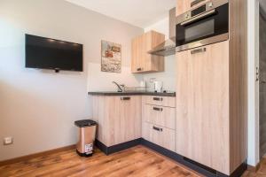 Appartements New Fully Renovated Family Studio : photos des chambres