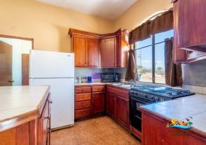 Family resort home, pools, tennis, clean shady beach and family golfing