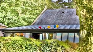 Maisons de vacances Le Gite les NUZ ( parc du chateau de Kerouartz) : photos des chambres