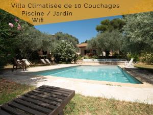 Villas Villa climatise Piscine Jardin Terrasse 10 personnes : photos des chambres