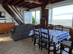 Maisons de vacances Maison les pieds dans l'eau : photos des chambres