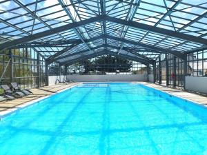 Villages vacances Les Cottages de La Baule : Chalet de standing 7 personnes - Piscine : photos des chambres