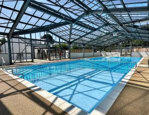 Villages vacances Les Cottages de La Baule : Chalet de standing 7 personnes - Piscine : photos des chambres