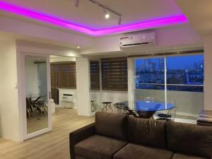 Cozy60sqm 1BR balconyprkingWifiNtflix near Mall