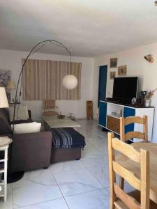 Villas Villa climatisee a 3 min du centre ville a pied. : photos des chambres