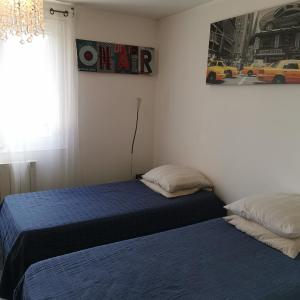 Maison 48m2 deux chambres cour privé et personnelle pour motos ou voitures 5 Pers proche mairie et bus tram