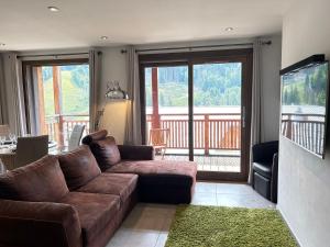 Appartement 48m² face aux pistes avec balcon, 4 couchages, près du centre des Gets, garage inclus - FR-1-623-330