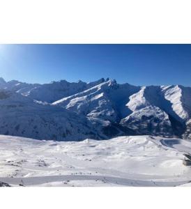 Appartements Penthouse T2 Valmeinier 1900 skis aux pieds : photos des chambres