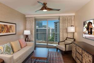 One-Bedroom Suite with Two Double Beds and Partial Ocean View room in The Grand Islander by Hilton Grand Vacations