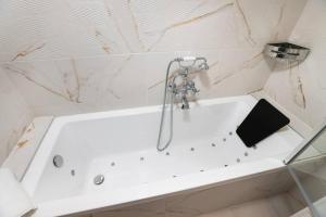 Appartements Le Palais d'Alienor - parking gratuit : photos des chambres