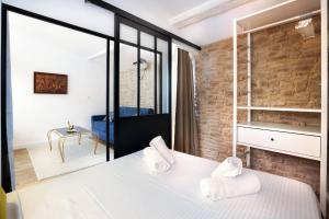 Appartements Le Palais d'Alienor - parking gratuit : photos des chambres