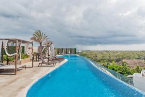Menesse Tulum Luxury Apartments by Spot Rentals