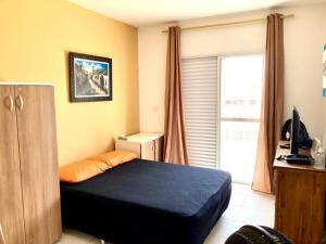 Apartamento studio em prédio de frente ao mar Massaguaçu Caraguatatuba