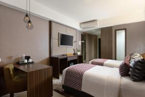 Phòng Hai Giường Đơn Loại Sang (Deluxe Twin Room)