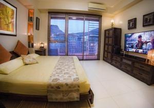 Deluxe family beach apartment with lagoon view at Pico de Loro