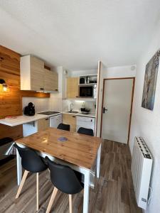 Appartements Chaleureux logement pieds des pistes Valmeinier 1800 - Vue Montagne - 6 personnes : photos des chambres