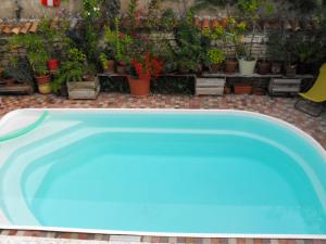 Villas Maison de ville terrasse piscine jardin : photos des chambres