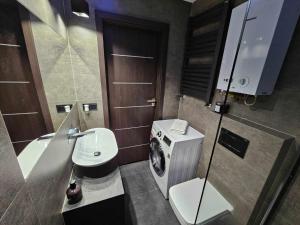 Apartament w centrum miasta z balkonem