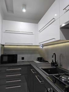 Apartament w centrum miasta z balkonem