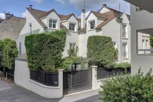 Appartements L'ATHOS - Appartement equipe - Entre Paris et Versailles - Haut debit : photos des chambres