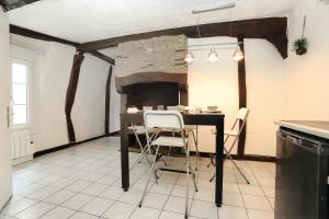 Appartements Le Petit Louis - Appt en plein centre : photos des chambres