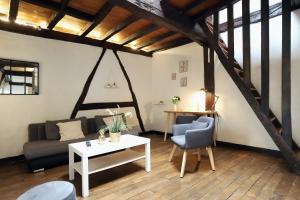 Appartements Le Petit Louis - Appt en plein centre : photos des chambres