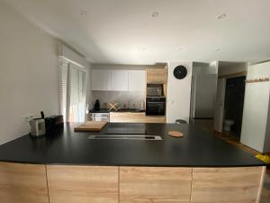 Appartements Appartement calme et lumineux proche de Lyon : Appartement - Vue sur Jardin