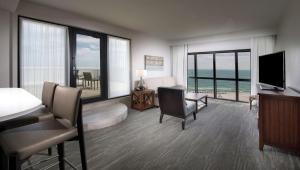 One-Bedroom Corner King Suite room in The Island House Hotel a Doubletree by Hilton