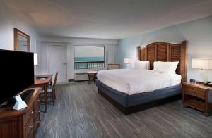 Gulf Front King Room with Balcony room in The Island House Hotel a Doubletree by Hilton