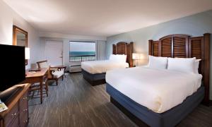 Gulf Front Queen Room with Two Queen Beds and Balcony room in The Island House Hotel a Doubletree by Hilton