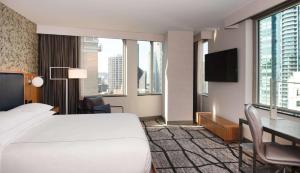 King Corner Room with City View room in The Charter Seattle Curio Collection By Hilton
