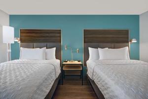 Queen Room with Two Queen Beds room in Tru By Hilton Gaylord Mi